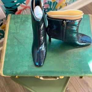Nine West; Metallic blue stiletto bootie. Date night or casual vibe.